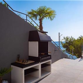 Luxury Beachfront Villa with Heated Infinity Pool near Trogir, Sleeps 8